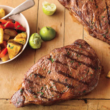 Caribbean Ribeye Steaks with Grilled Pineapple Salad