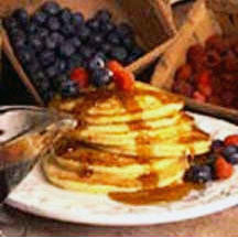 Whole-Wheat Buttermilk Pancakes with Maple Syrup and Fresh Berries