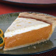 Zesty Cream Topped Orange Pumpkin Pie