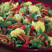 Garden Greens with Curried Cauliflower and Pecans