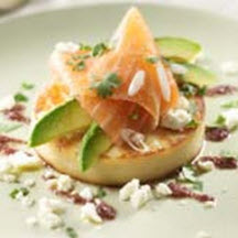 Warm Chickpea Pancake with Feta Cheese, Smoked Salmon, Avocado Salad and Black Olive Oil