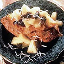 Baked Sweet Potatoes with Tropical Orange-Raisin Sauce