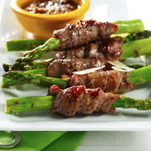 Beef-Wrapped Asparagus Spears with Sesame and Chipotle Sauce