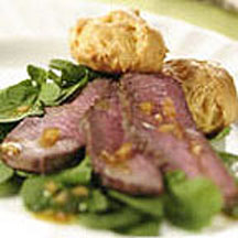 Baby Arugula Salad with Grilled Beef Sirloin and Gruyère-Gougere