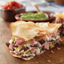 View the recipe Layered Ham and Cheese Quesadillas. Layered Ham and Cheese Quesadillas